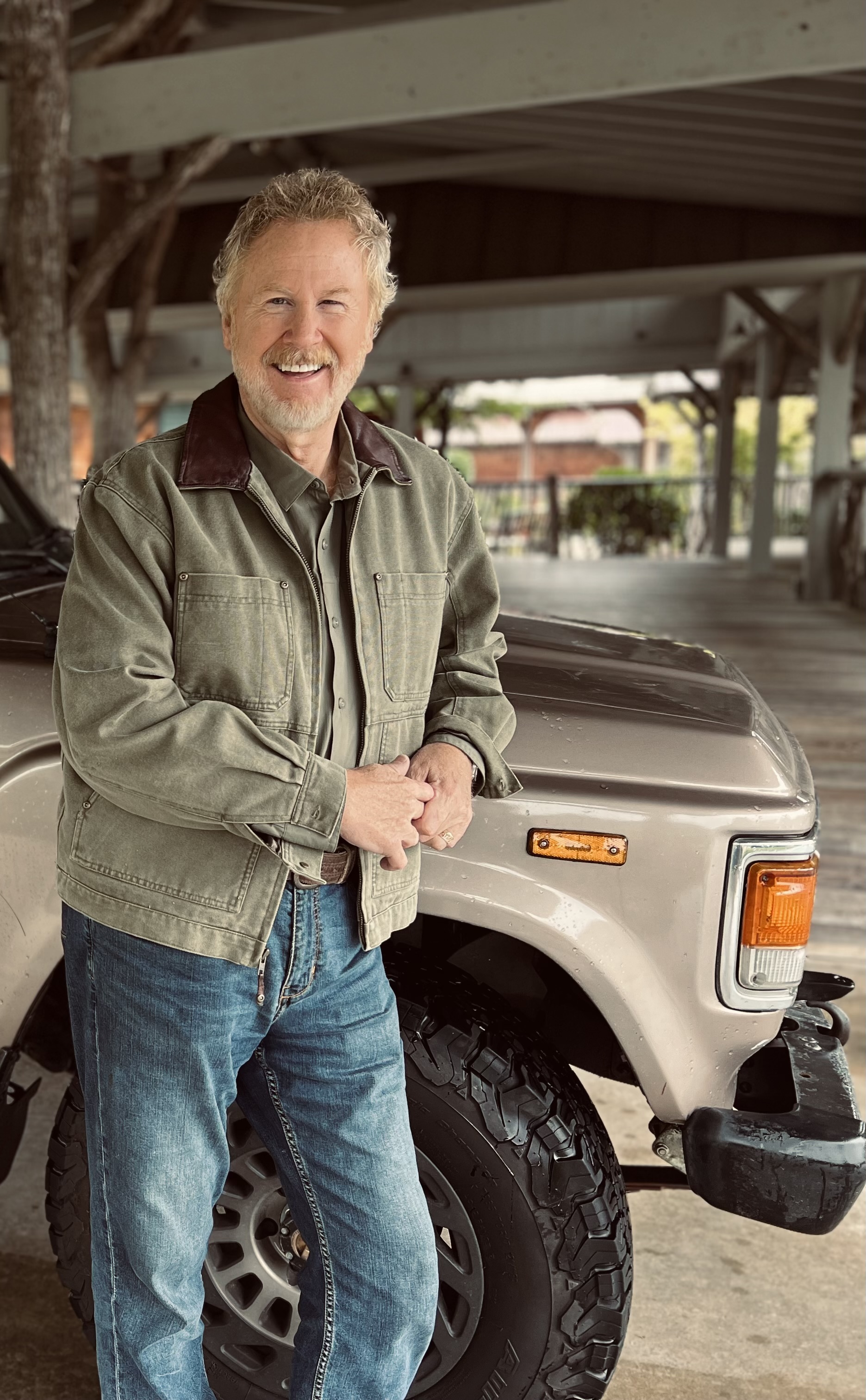 Pastor Mike Atkins standing by his Land Cruiser